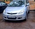 Серый Мазда 5, объемом двигателя 2 л и пробегом 280 тыс. км за 4990 $, фото 1 на Automoto.ua