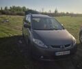 Серый Мазда 5, объемом двигателя 2 л и пробегом 300 тыс. км за 4700 $, фото 1 на Automoto.ua