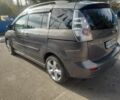 Серый Мазда 5, объемом двигателя 2 л и пробегом 226 тыс. км за 6500 $, фото 1 на Automoto.ua