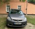 Серый Мазда 5, объемом двигателя 2 л и пробегом 176 тыс. км за 5500 $, фото 1 на Automoto.ua