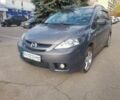 Серый Мазда 5, объемом двигателя 2 л и пробегом 226 тыс. км за 6500 $, фото 1 на Automoto.ua