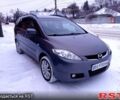 Серый Мазда 5, объемом двигателя 2 л и пробегом 317 тыс. км за 5500 $, фото 1 на Automoto.ua