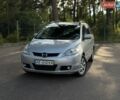 Серый Мазда 5, объемом двигателя 2 л и пробегом 268 тыс. км за 6000 $, фото 1 на Automoto.ua