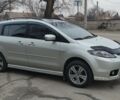 Серый Мазда 5, объемом двигателя 2 л и пробегом 411 тыс. км за 7000 $, фото 1 на Automoto.ua
