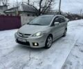 Серый Мазда 5, объемом двигателя 2 л и пробегом 231 тыс. км за 5350 $, фото 1 на Automoto.ua