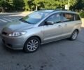 Серый Мазда 5, объемом двигателя 2 л и пробегом 365 тыс. км за 4999 $, фото 1 на Automoto.ua