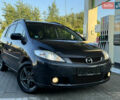 Серый Мазда 5, объемом двигателя 2 л и пробегом 256 тыс. км за 5599 $, фото 1 на Automoto.ua
