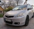 Серый Мазда 5, объемом двигателя 2 л и пробегом 232 тыс. км за 6000 $, фото 1 на Automoto.ua