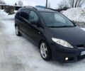 Серый Мазда 5, объемом двигателя 2 л и пробегом 235 тыс. км за 4150 $, фото 1 на Automoto.ua