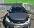 Серый Мазда 5, объемом двигателя 2 л и пробегом 400 тыс. км за 3513 $, фото 1 на Automoto.ua
