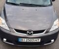 Серый Мазда 5, объемом двигателя 2 л и пробегом 184 тыс. км за 5500 $, фото 2 на Automoto.ua