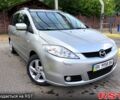 Серый Мазда 5, объемом двигателя 2 л и пробегом 257 тыс. км за 6500 $, фото 1 на Automoto.ua