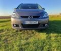 Серый Мазда 5, объемом двигателя 2 л и пробегом 195 тыс. км за 5000 $, фото 1 на Automoto.ua