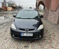 Серый Мазда 5, объемом двигателя 2 л и пробегом 250 тыс. км за 2300 $, фото 1 на Automoto.ua