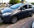 Серый Мазда 5, объемом двигателя 1.8 л и пробегом 240 тыс. км за 5500 $, фото 1 на Automoto.ua