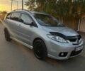 Серый Мазда 5, объемом двигателя 2 л и пробегом 350 тыс. км за 5000 $, фото 1 на Automoto.ua