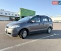 Серый Мазда 5, объемом двигателя 2 л и пробегом 233 тыс. км за 6200 $, фото 1 на Automoto.ua