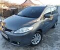 Серый Мазда 5, объемом двигателя 2 л и пробегом 236 тыс. км за 7100 $, фото 1 на Automoto.ua