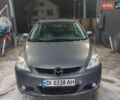 Серый Мазда 5, объемом двигателя 1.8 л и пробегом 251 тыс. км за 5400 $, фото 1 на Automoto.ua