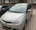 Серый Мазда 5, объемом двигателя 2 л и пробегом 214 тыс. км за 5600 $, фото 1 на Automoto.ua
