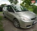 Серый Мазда 5, объемом двигателя 1.8 л и пробегом 218 тыс. км за 5500 $, фото 3 на Automoto.ua
