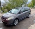 Серый Мазда 5, объемом двигателя 2 л и пробегом 300 тыс. км за 5300 $, фото 1 на Automoto.ua
