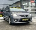 Серый Мазда 5, объемом двигателя 2 л и пробегом 264 тыс. км за 6000 $, фото 1 на Automoto.ua