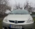Серый Мазда 5, объемом двигателя 2 л и пробегом 414 тыс. км за 4100 $, фото 2 на Automoto.ua
