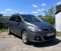 Серый Мазда 5, объемом двигателя 2 л и пробегом 335 тыс. км за 6200 $, фото 1 на Automoto.ua