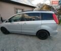 Серый Мазда 5, объемом двигателя 2 л и пробегом 232 тыс. км за 6000 $, фото 1 на Automoto.ua