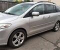 Серый Мазда 5, объемом двигателя 2 л и пробегом 290 тыс. км за 7500 $, фото 1 на Automoto.ua