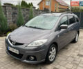 Серый Мазда 5, объемом двигателя 2 л и пробегом 254 тыс. км за 4650 $, фото 1 на Automoto.ua
