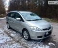 Серый Мазда 5, объемом двигателя 2 л и пробегом 179 тыс. км за 6400 $, фото 1 на Automoto.ua