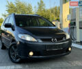 Серый Мазда 5, объемом двигателя 2 л и пробегом 256 тыс. км за 5599 $, фото 1 на Automoto.ua