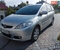 Серый Мазда 5, объемом двигателя 2 л и пробегом 330 тыс. км за 6500 $, фото 1 на Automoto.ua