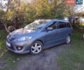 Серый Мазда 5, объемом двигателя 2.01 л и пробегом 253 тыс. км за 6500 $, фото 1 на Automoto.ua
