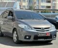 Сірий Мазда 5, об'ємом двигуна 2 л та пробігом 317 тис. км за 6990 $, фото 2 на Automoto.ua