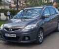 Серый Мазда 5, объемом двигателя 2 л и пробегом 236 тыс. км за 7000 $, фото 1 на Automoto.ua
