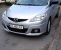 Серый Мазда 5, объемом двигателя 1.8 л и пробегом 275 тыс. км за 6500 $, фото 1 на Automoto.ua