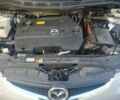 Серый Мазда 5, объемом двигателя 2 л и пробегом 235 тыс. км за 6350 $, фото 2 на Automoto.ua