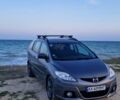 Серый Мазда 5, объемом двигателя 2 л и пробегом 290 тыс. км за 5400 $, фото 1 на Automoto.ua