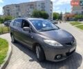 Серый Мазда 5, объемом двигателя 2 л и пробегом 260 тыс. км за 5300 $, фото 1 на Automoto.ua