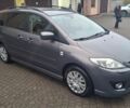 Серый Мазда 5, объемом двигателя 2 л и пробегом 206 тыс. км за 6500 $, фото 1 на Automoto.ua