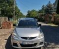 Серый Мазда 5, объемом двигателя 2 л и пробегом 304 тыс. км за 4300 $, фото 1 на Automoto.ua