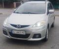 Серый Мазда 5, объемом двигателя 2 л и пробегом 277 тыс. км за 6250 $, фото 1 на Automoto.ua