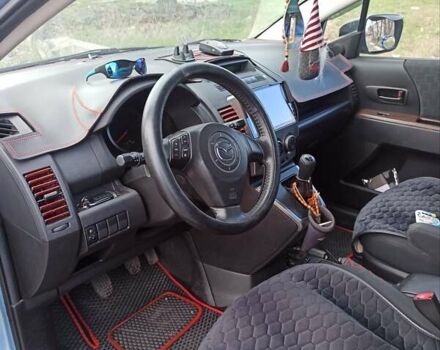 Серый Мазда 5, объемом двигателя 1.8 л и пробегом 206 тыс. км за 4700 $, фото 3 на Automoto.ua