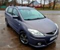 Серый Мазда 5, объемом двигателя 2 л и пробегом 290 тыс. км за 6490 $, фото 1 на Automoto.ua