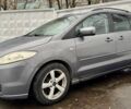 Серый Мазда 5, объемом двигателя 2 л и пробегом 320 тыс. км за 1850 $, фото 1 на Automoto.ua