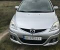 Серый Мазда 5, объемом двигателя 2 л и пробегом 213 тыс. км за 6000 $, фото 1 на Automoto.ua