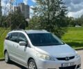 Серый Мазда 5, объемом двигателя 2 л и пробегом 200 тыс. км за 2650 $, фото 1 на Automoto.ua